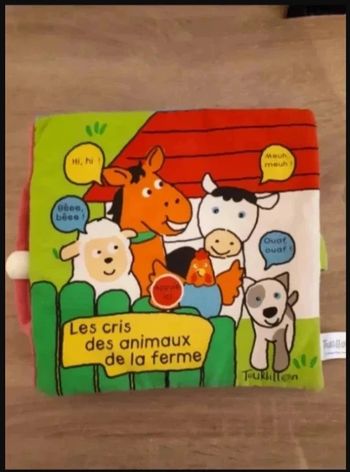 livre tissu pour bébé Les cris des animaux de la ferme musical Très bon état