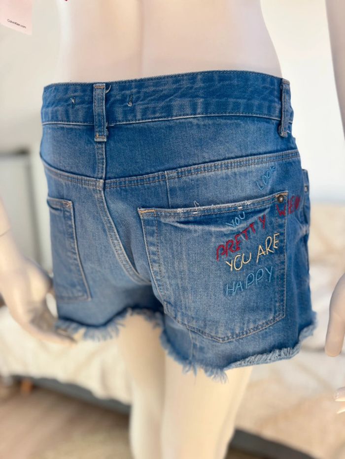 Jean déchiré avec poches apparentes T36 Zara - photo numéro 3