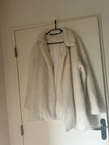 Manteau fausse fourrure taille XL