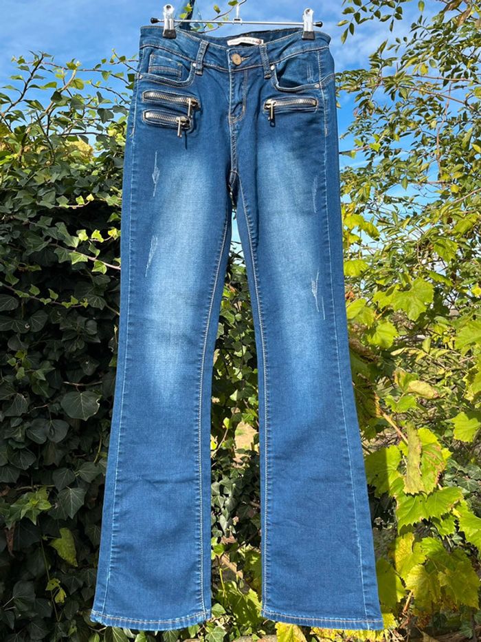 Jean taille basse pattes d’eph bleu nuancé - zips décoratifs