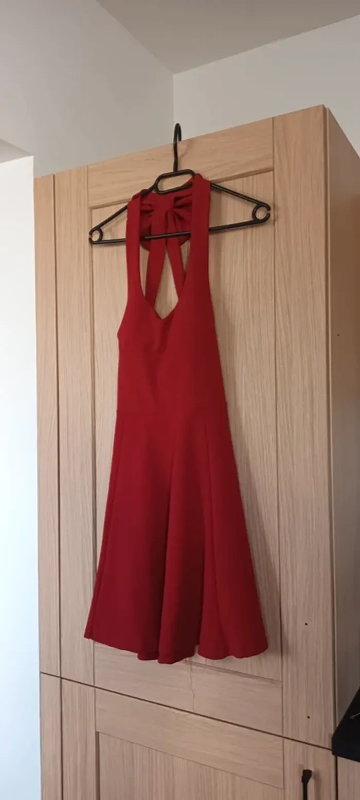 Robe patineuse nœud derrière