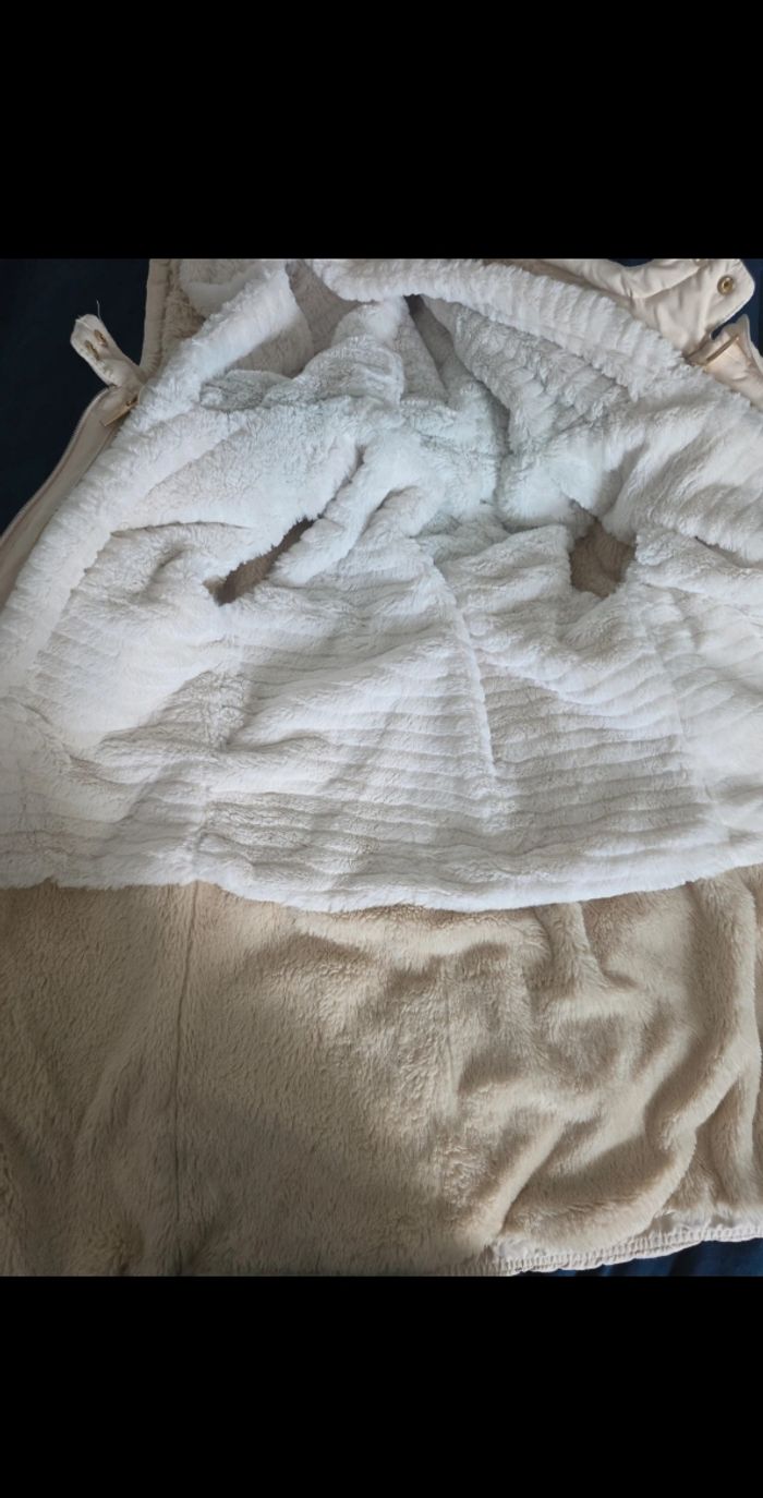 Doudoune manches longues en twill et sherpa + gilet pour fille

Taille 12ans - photo numéro 3