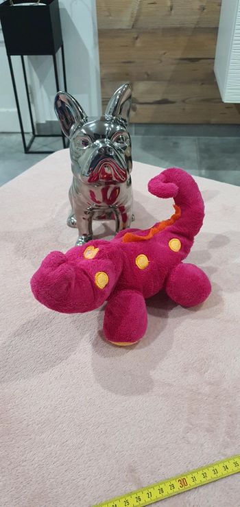Peluche rose et jaune Dinosaure