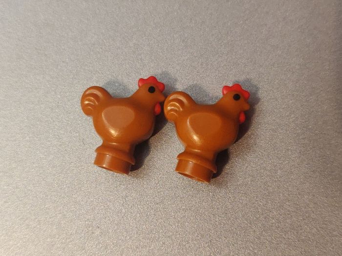 2 poules Lego - en parfait état jamais utilisées - vrai Lego