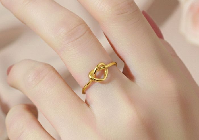 Bague dorée noeud coeur réglable en acier inoxydable - photo numéro 2