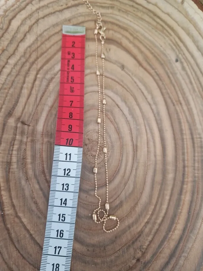 Collier fantaisie doré perles allongées - photo numéro 3