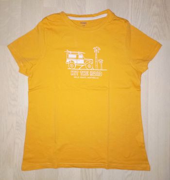 Tee-shirt orange clair motif safari
Kiabi 
T. 10 ans 
NEUF