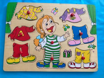 Puzzle encastrement s’habiller