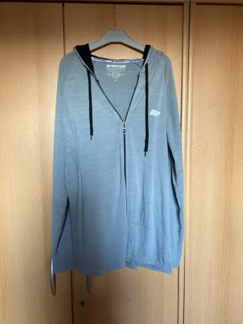 Gilet zippé à capuche