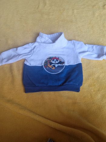 Pull avec boule de paillette