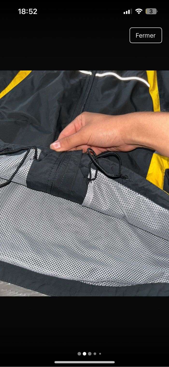 Veste ASICS qui peut se porter en doudoune sans manches - photo numéro 2