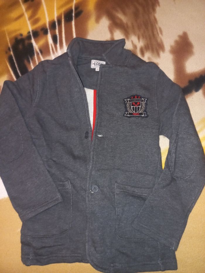 Pull et petite veste 8 ans