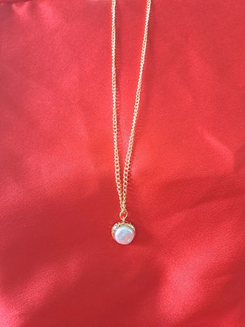 Collier pendentif perle