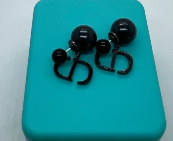 Boucles d’oreilles perle noir aiguilles argent s925