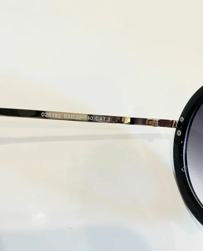 Lunette de soleil femme ronde noire et dorée verres dégradés UV protection catégorie 3 - photo numéro 4