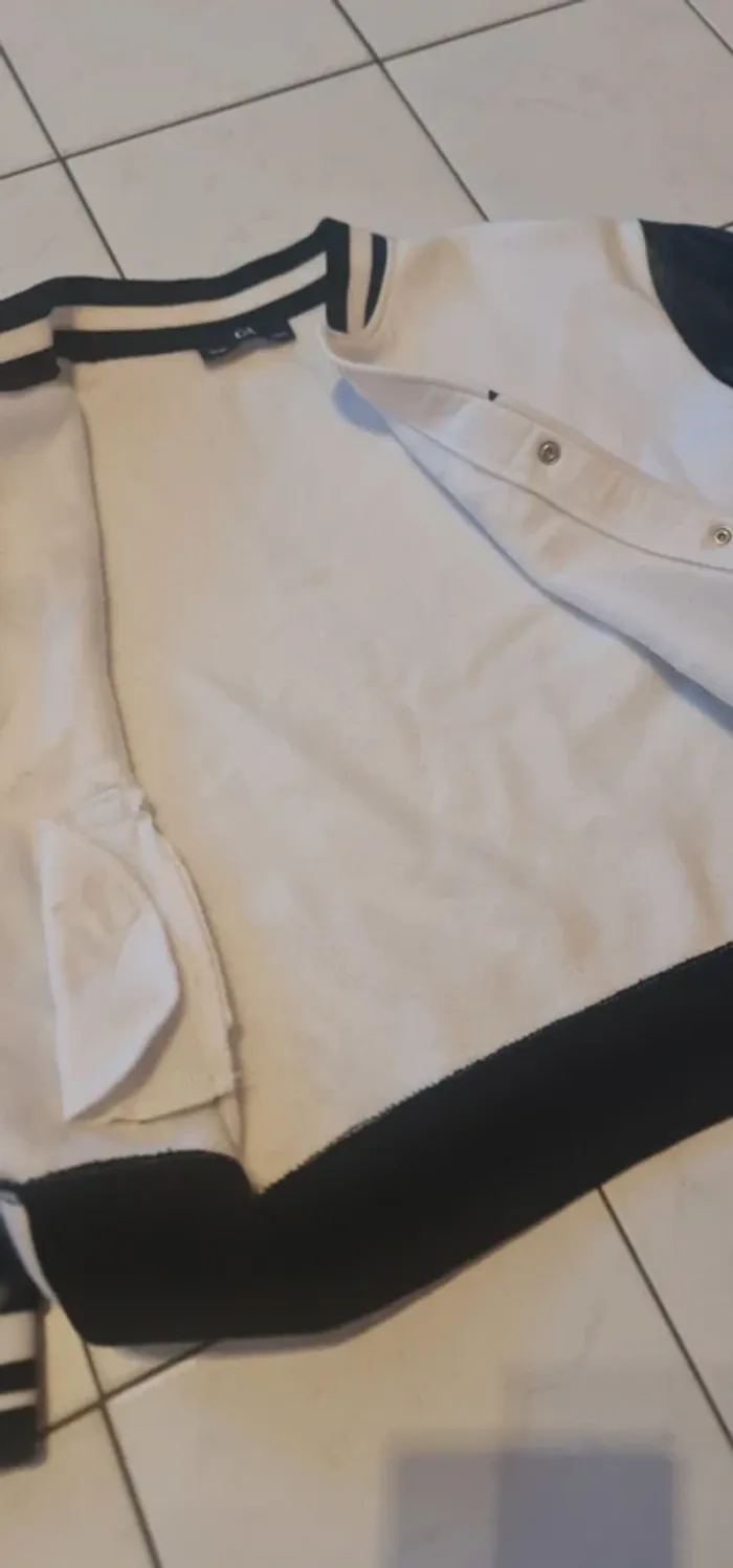 Blouson mi saison. 9/10ans - photo numéro 6
