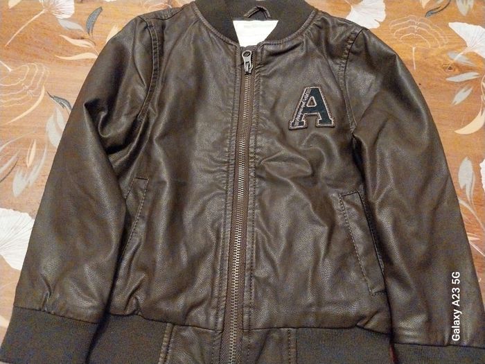 Blouson marron. simili cuir