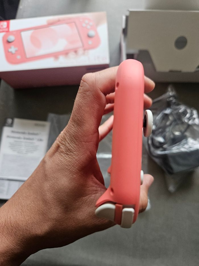 Switch lite rose en parfait état - photo numéro 6