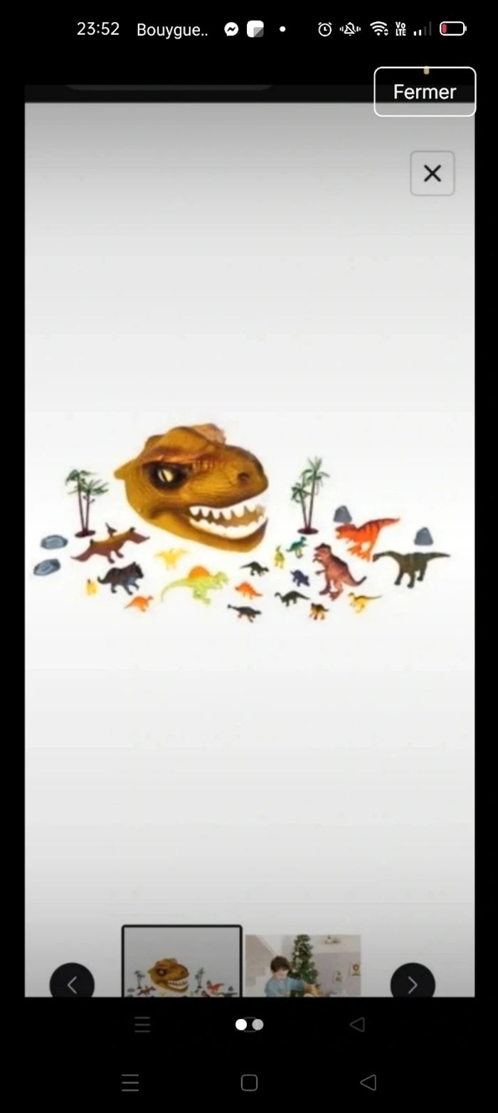 Tête de dinosaure et 20 figurines neuf