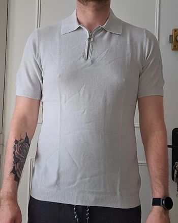 Polo avec col zippé