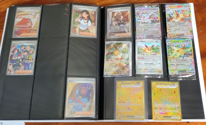 Collection cartes Pokemon ( 229 cartes sans doubles!) EV08.5 Évolution Prismatique - Lot classeur évoli + Pikachu gold 179 + Terapagos gold 180 + Full art (x7) + Promo Evoli ETB + Pokemon day +  10  pokeball + Evolition ex Stamp (X3) + ex + co/revers - photo numéro 4