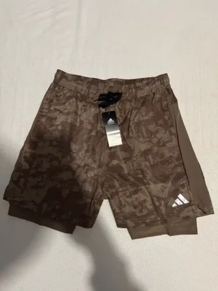 Short own the run spray dye 2-in-1 taille XL