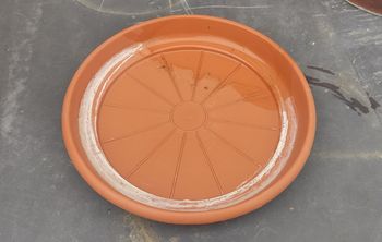 Dessous pot de fleur