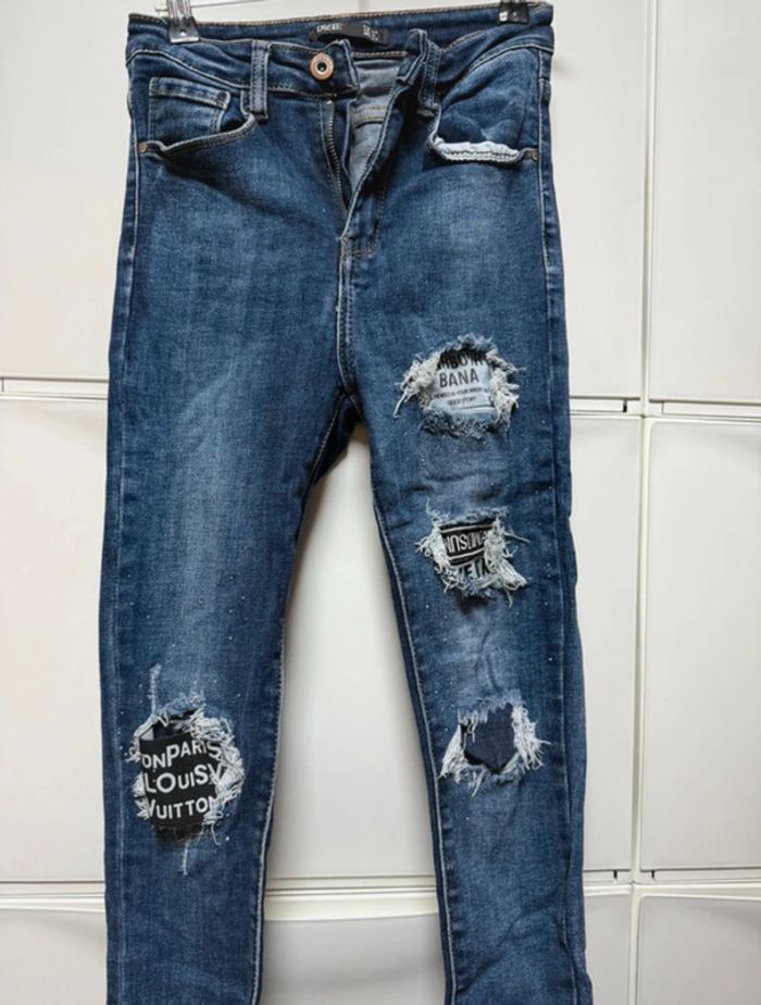 👖 Jean slim femme – Daysie Couleur bleu, avec effet troué tendance Taille 34