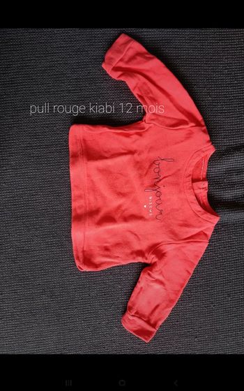 Pull rouge à motif