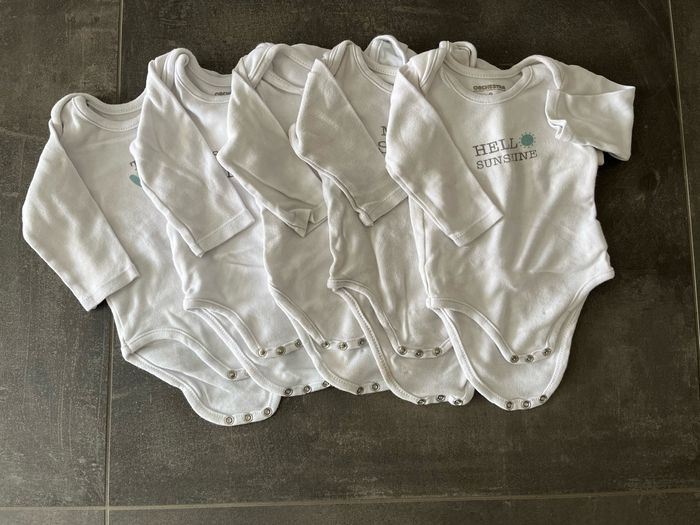Lot de 5 bodys taille 9 mois Orchestra