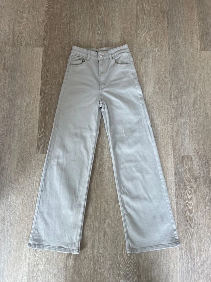 Jean sable coupe large