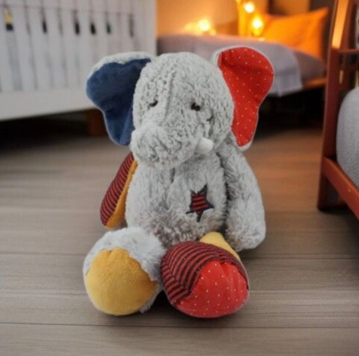 DOUDOU ÉLÉPHANT GRIS ROUGE JAUNE BLEU ÉTOILE TAPE A L'OEIL