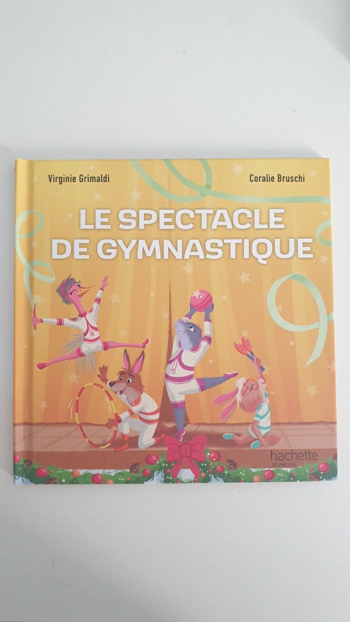 Neuf livre enfant Hachette Jeunesse sur le thème du sport Le spectacle de gymnastique