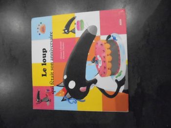Livre " Le loup fêtait son anniversaire"