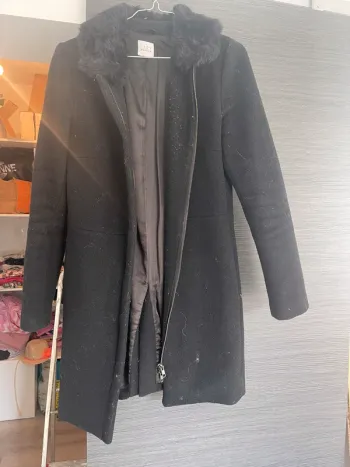 Manteau noir pailletté