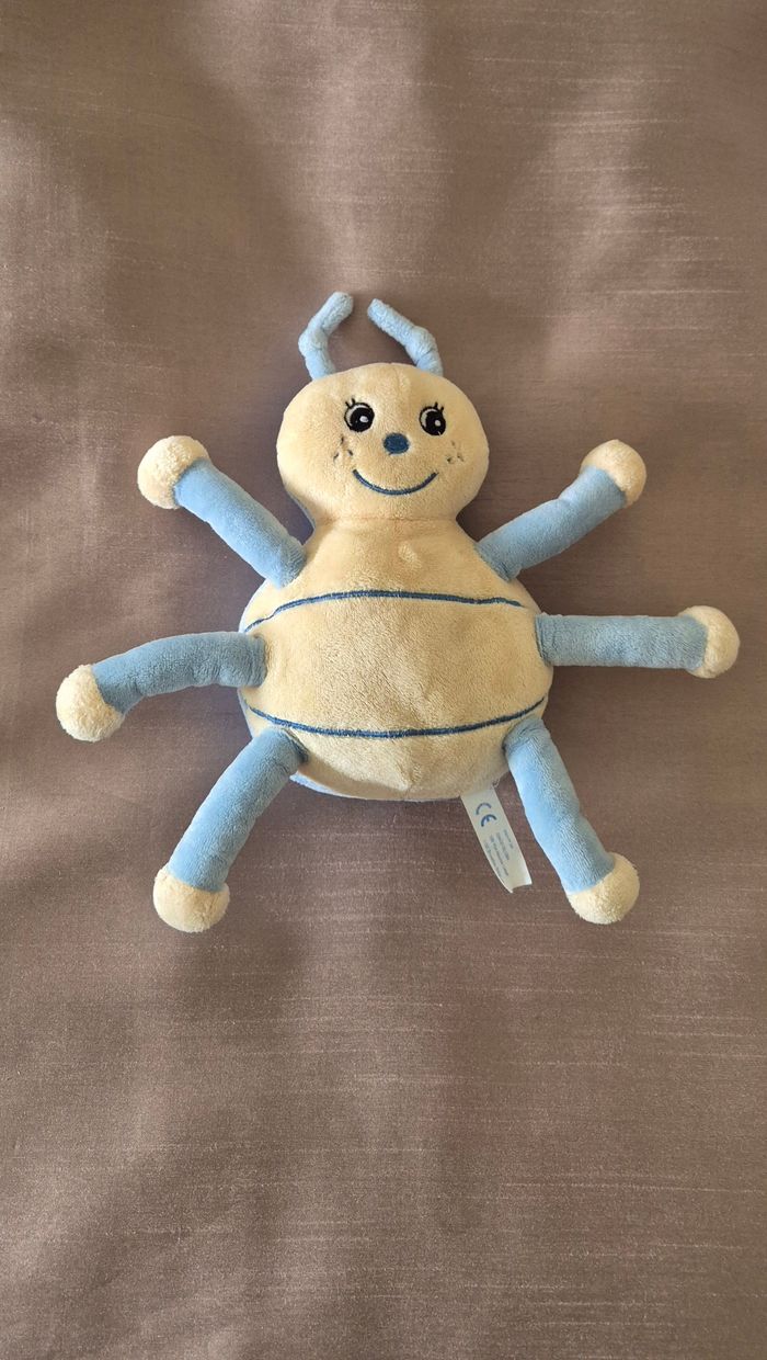 DOUDOU COCCINELLE BLEU AVEC GRELOT ARTHUR ET LOLA