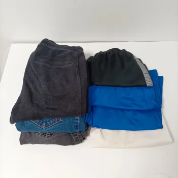 Lot garçon 9-10 ans rentrée scolaire : 2 jeans, 1 pantalon, 4 shorts (Nike, Kipsta, Barça) L024