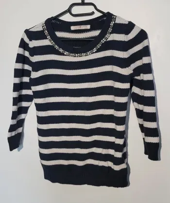 Pull avec perle