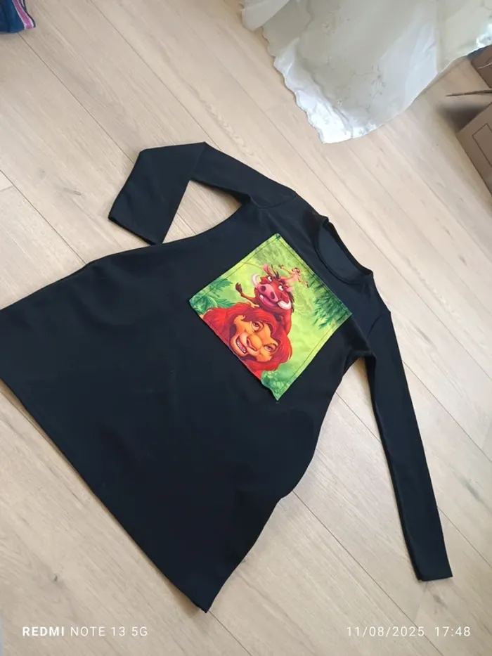 Magnifique robe le Roi Lion taille 12 ans
