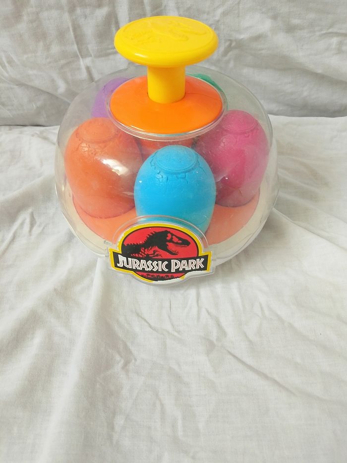 Toupie dino tourne et pop Jurassic park tomy