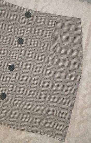 Jupe courte à boutons 42