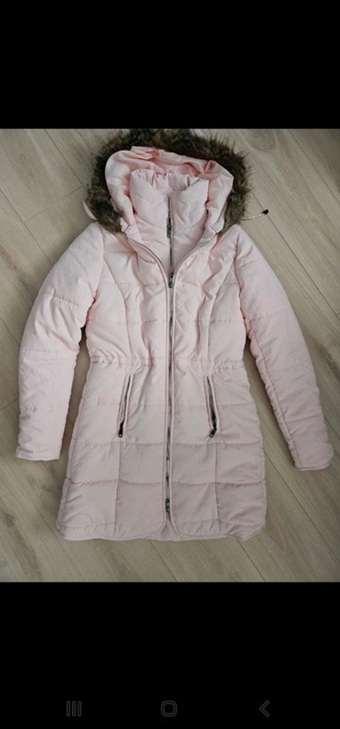 Manteau rose poudré