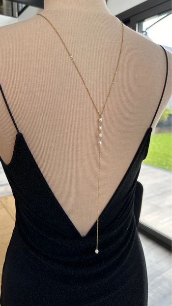 Collier dos en perle et acier or