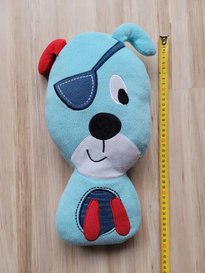 Chien coussin, taille 40 cm, très bon état.