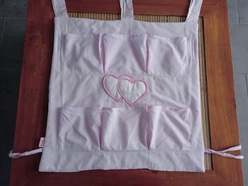 Porte rangement lit bébé