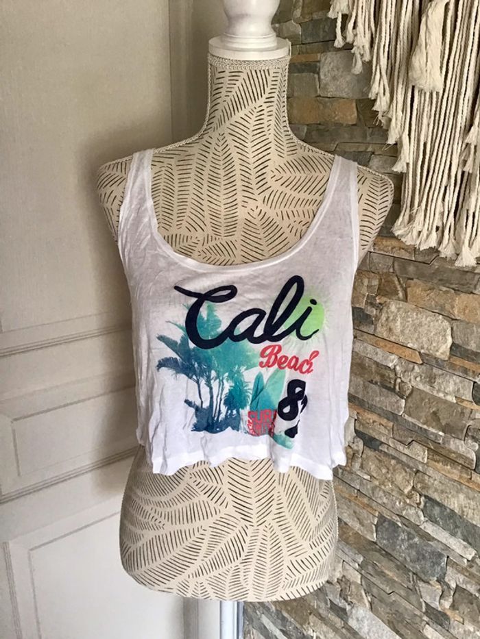 Top court blanc a motif taille L