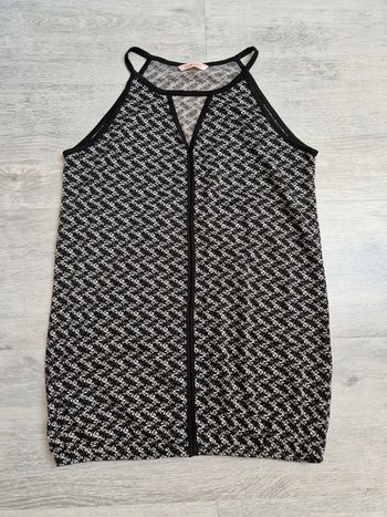 Top camaïeu noir et crème étiquette de taille coupée mais convient à un 34/36