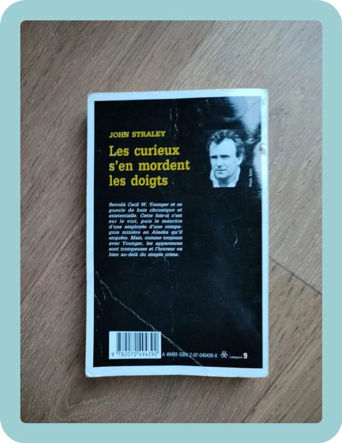 Roman Série Noire Les curieux s'en mordent les doigts - photo numéro 2