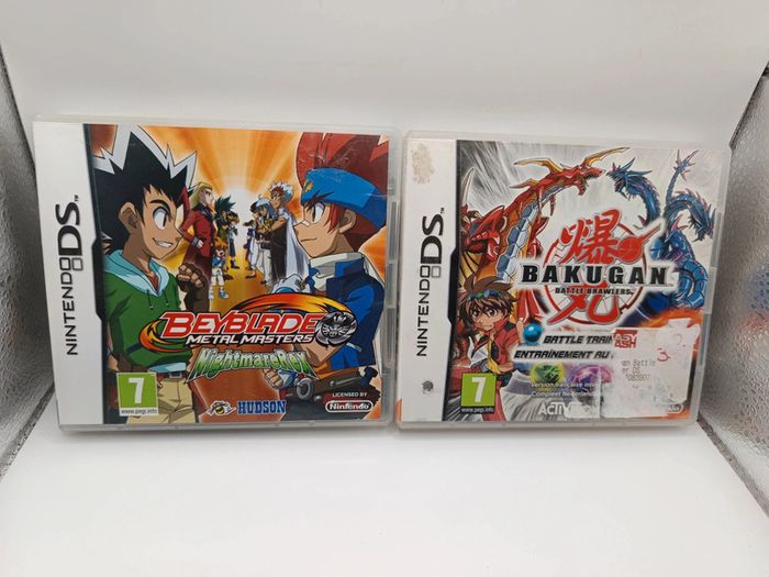 Lot 2 jeux Nintendo Ds occasion Bakugan battle brawlers/ Beyblade métal masters