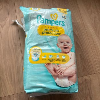 Couche Pampers T2